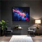 Modern living room with abstract artwork on the wall, chairs, and a lamp.