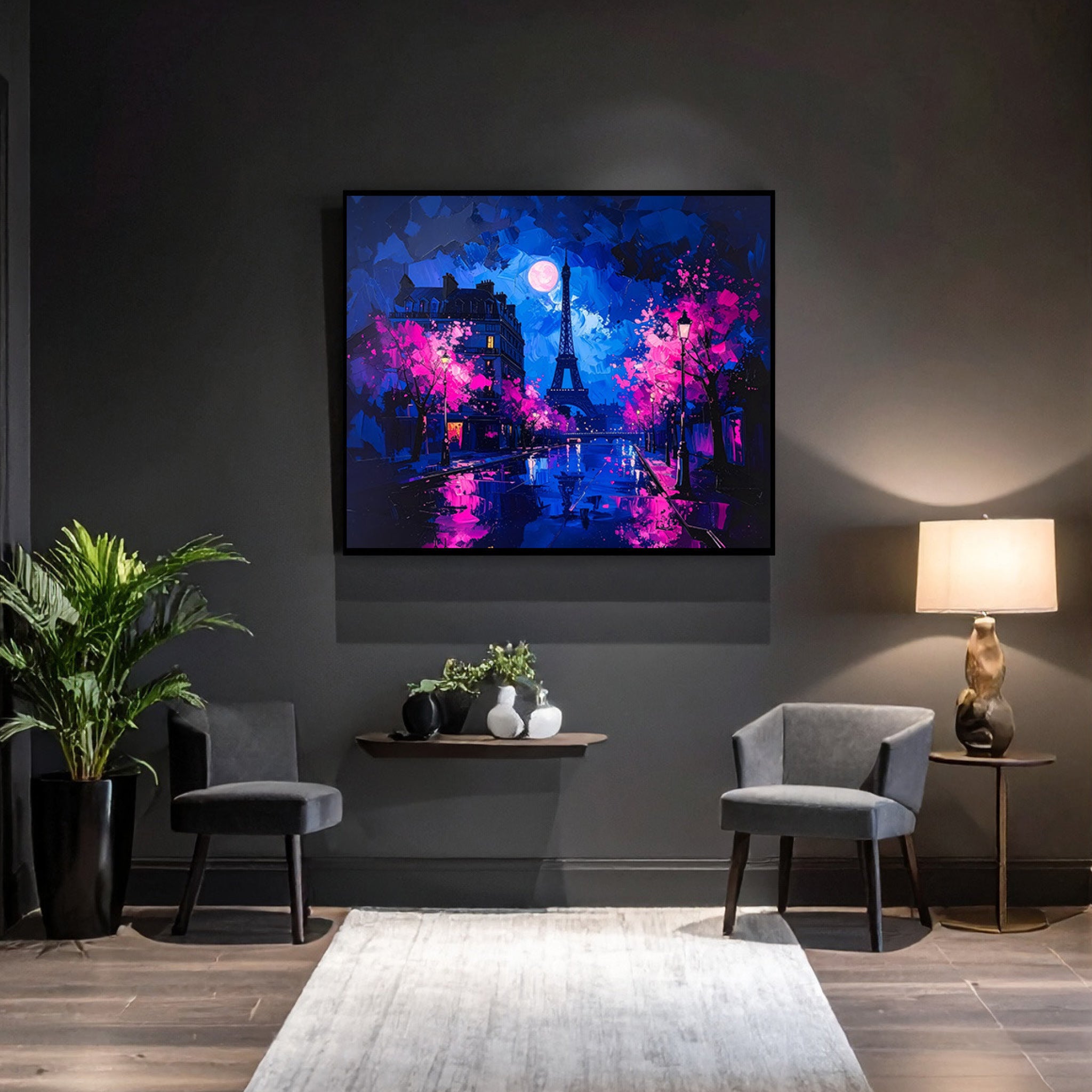 Modern living room with a colorful abstract painting on the wall, two chairs, a lamp, and decorative items.